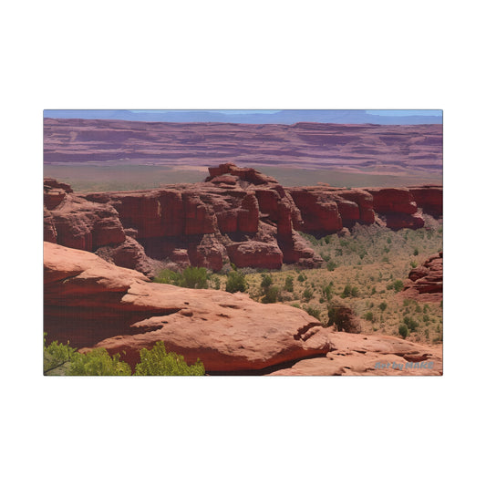 Sunlit sands and red rock formations