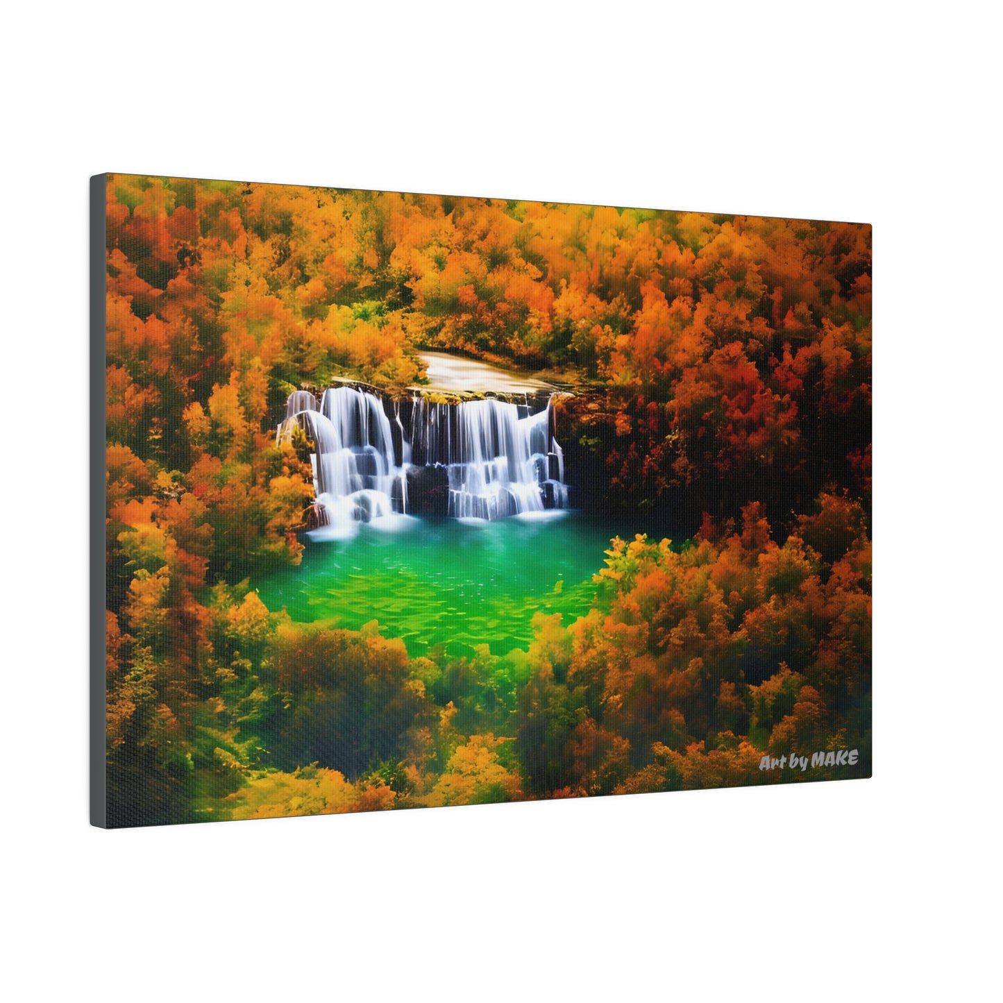 Golden leaves framing a waterfall lake